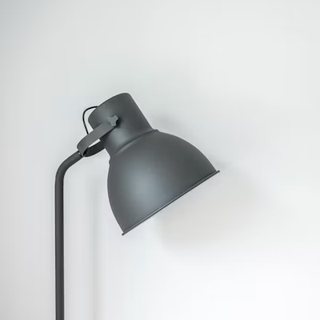 Lamp lighting a wall